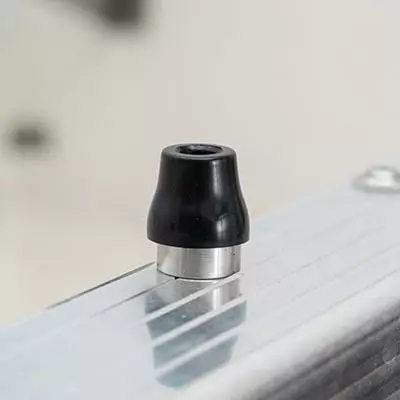 Component in rubber for flat roof hatch 
